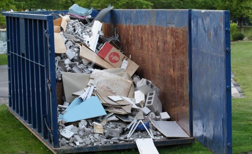 Front view of a skip outside a Muswell Hill property