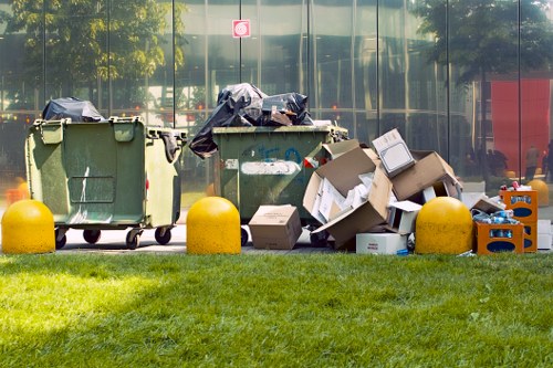 Customer service representative assisting with skip hire booking