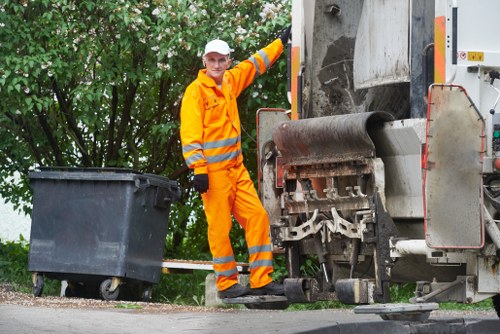 Team removing garden debris safely in Muswell Hill